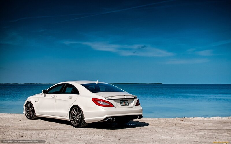White Mercedes-Benz on beach