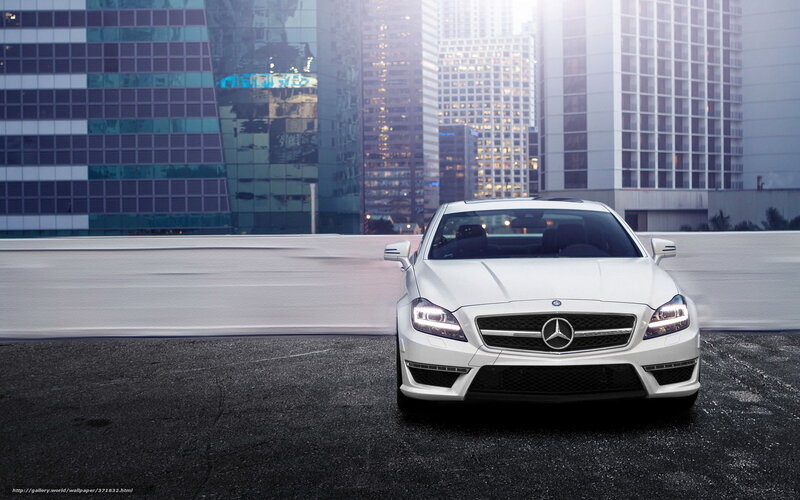 White Mercedes-Benz on city street