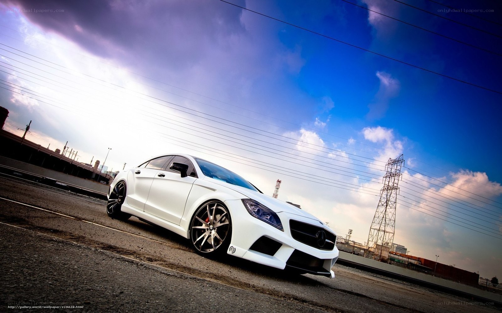 white mercedes-benz on road