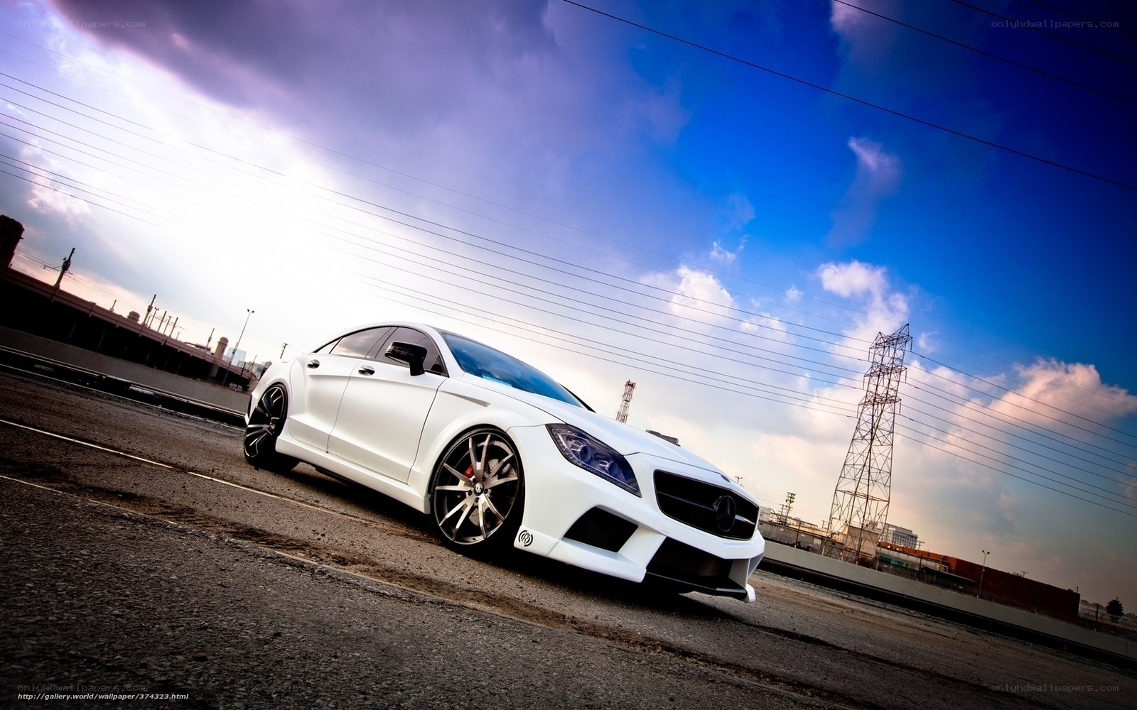 white mercedes-benz on road