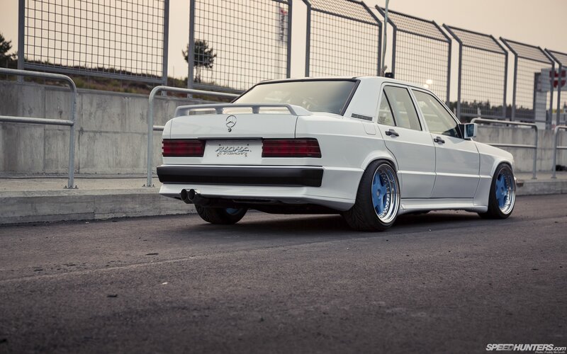 white mercedes-benz on track