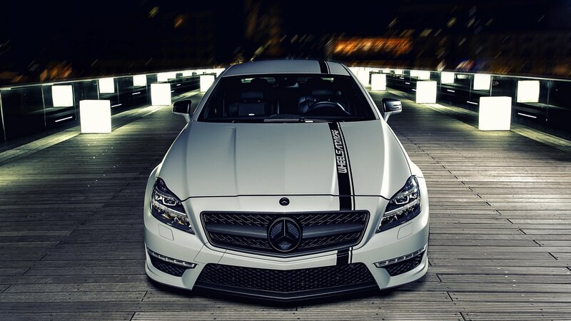 white mercedes-benz on wooden deck