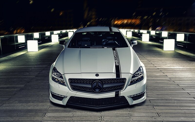 white mercedes-benz on wooden deck