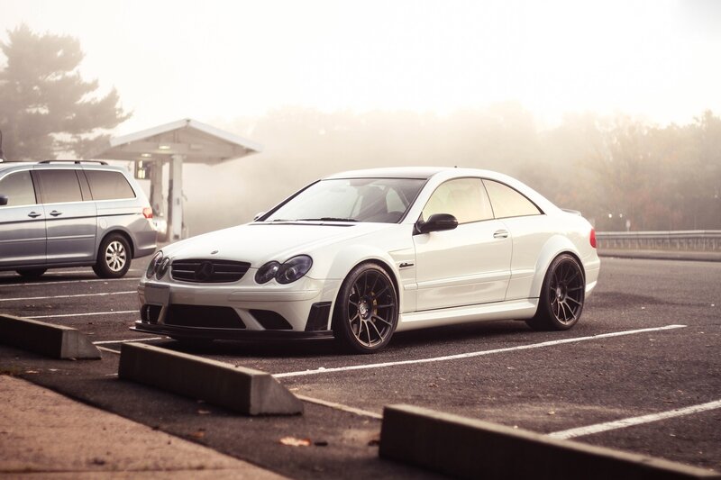 White Mercedes-Benz parked in lot