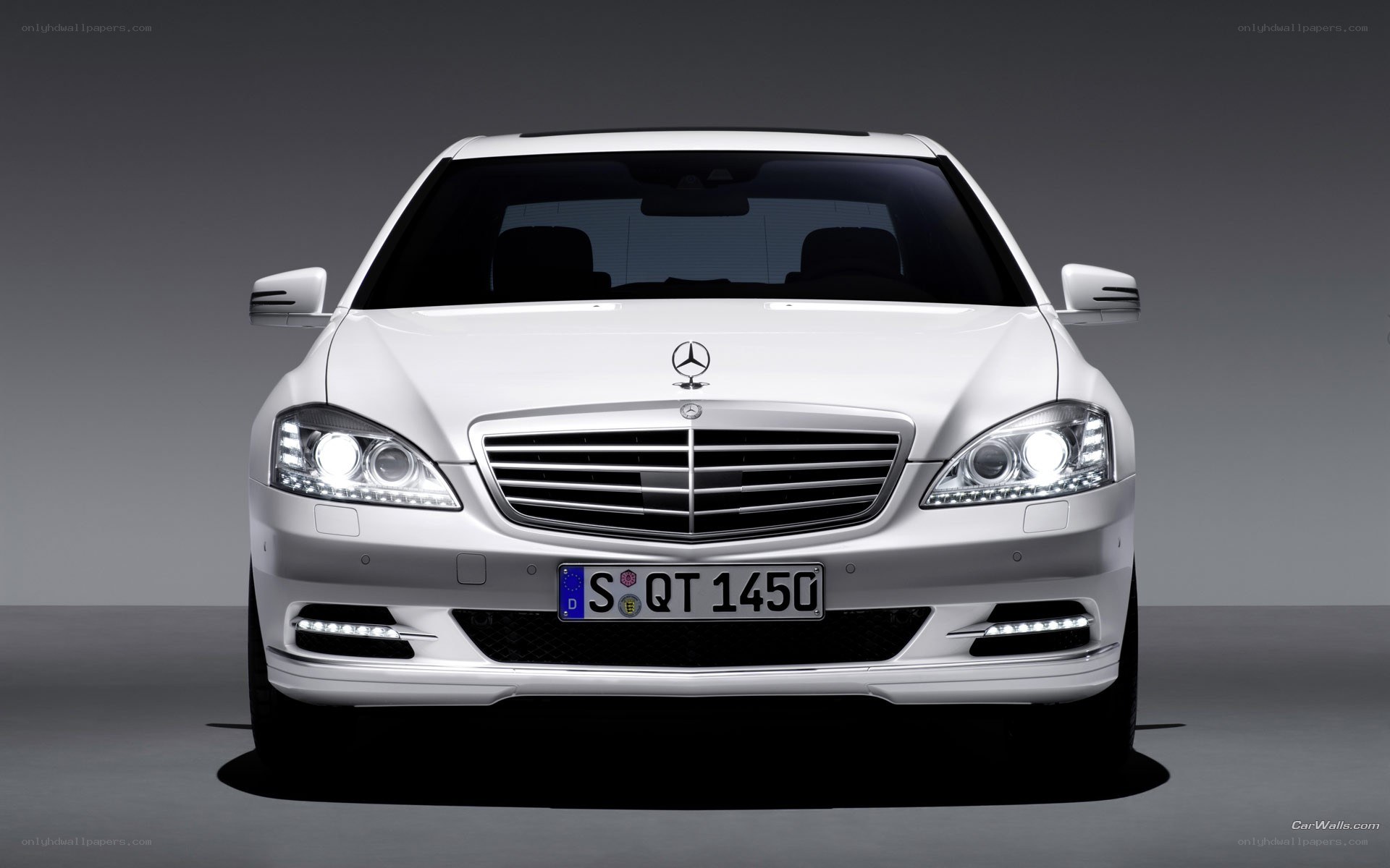 white mercedes-benz s-class
