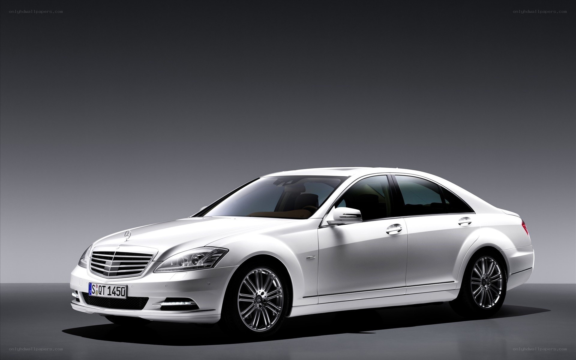 white mercedes-benz s-class