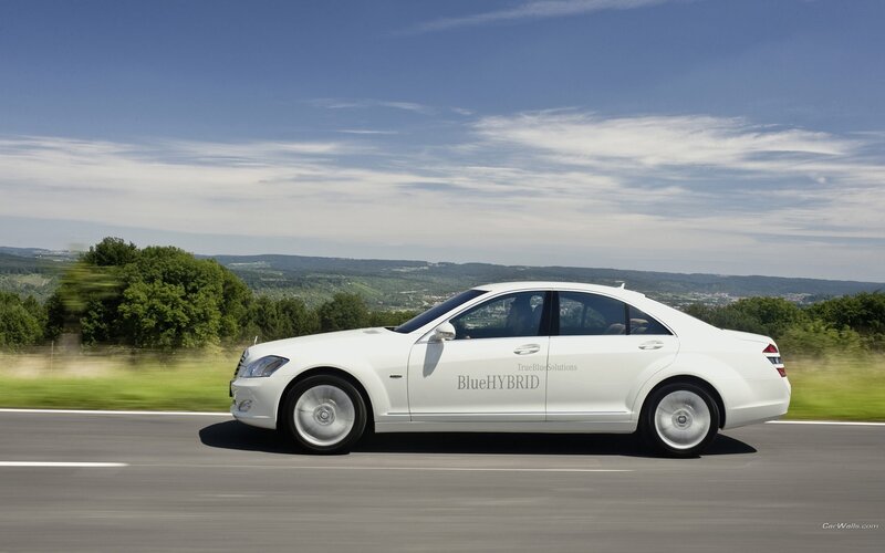 White Mercedes-Benz S-Class driving