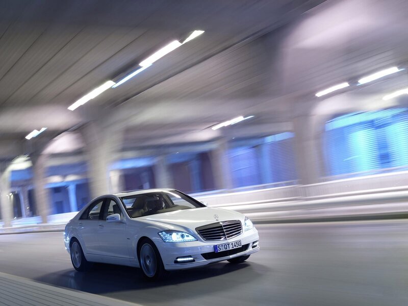 White Mercedes-Benz S-Class in motion