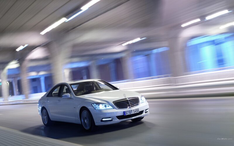 White Mercedes-Benz S-Class in motion
