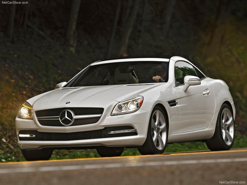 white mercedes-benz slk driving