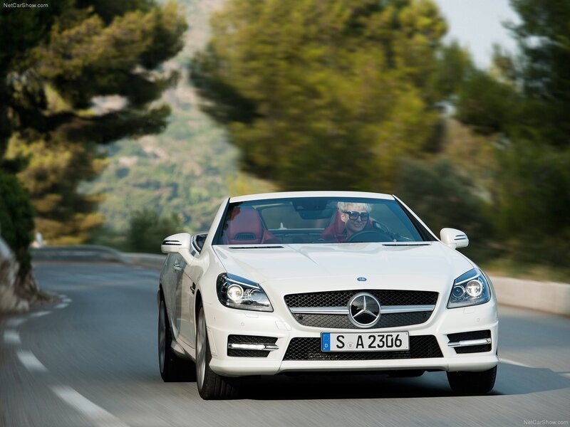 white mercedes-benz slk driving
