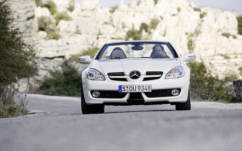 white mercedes-benz slk driving