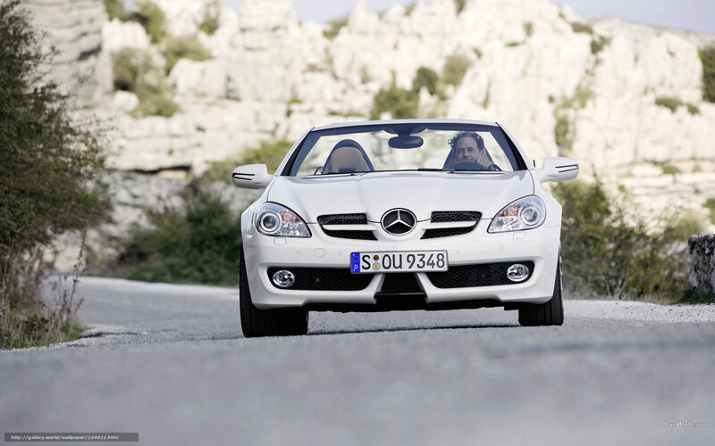 White Mercedes-Benz SLK driving on road