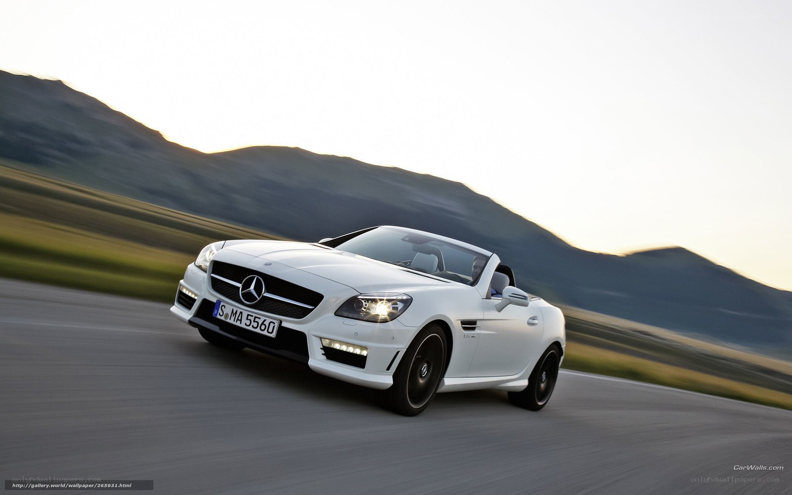 White Mercedes-Benz SLK driving