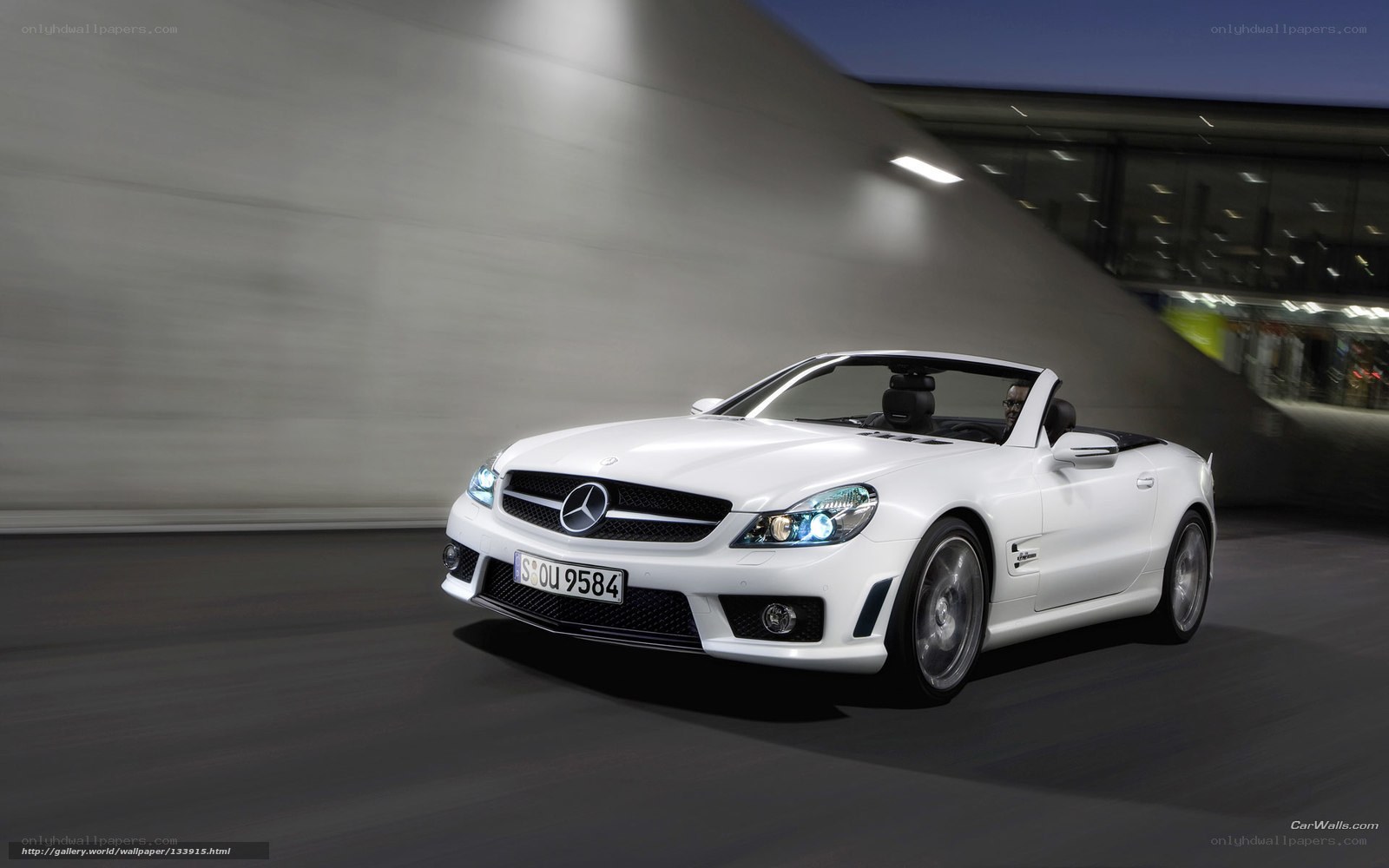 White Mercedes-Benz SLK in motion
