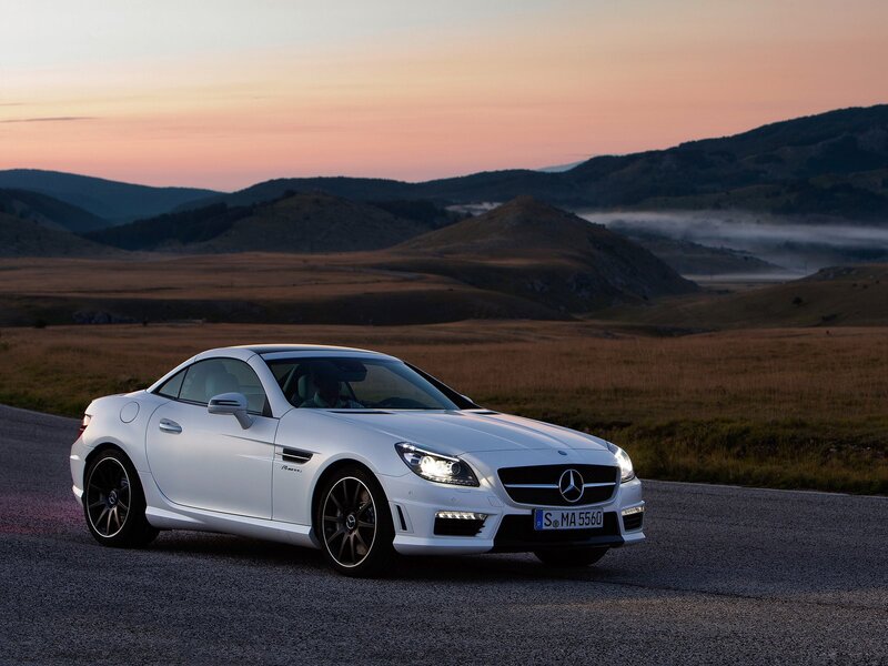 White Mercedes-Benz SLK on a mountain road