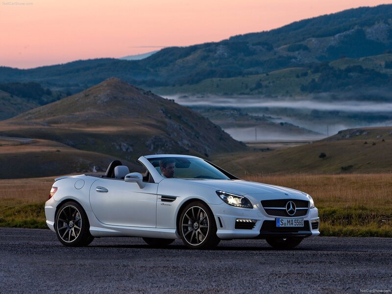 White Mercedes-Benz SLK parked at sunset