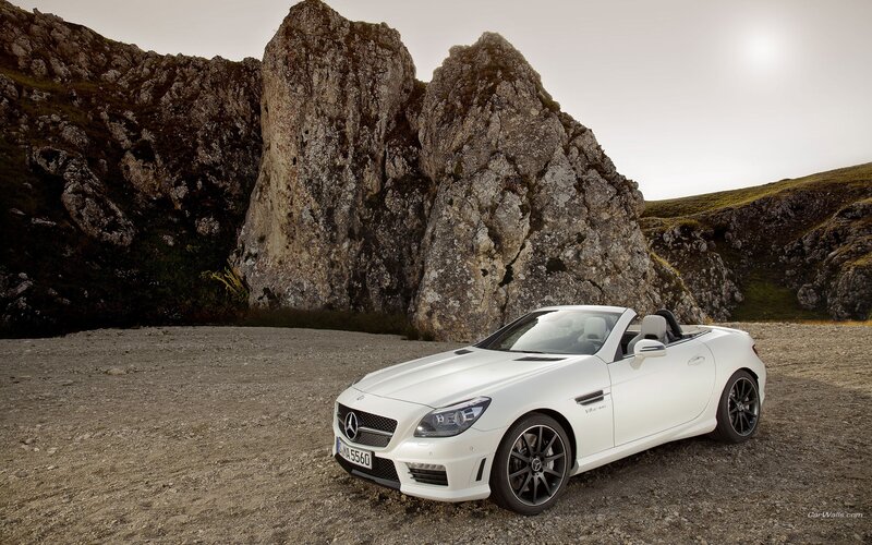 White Mercedes-Benz SLK parked in mountains