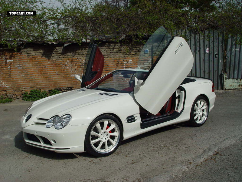 White Mercedes-Benz SLR with doors open