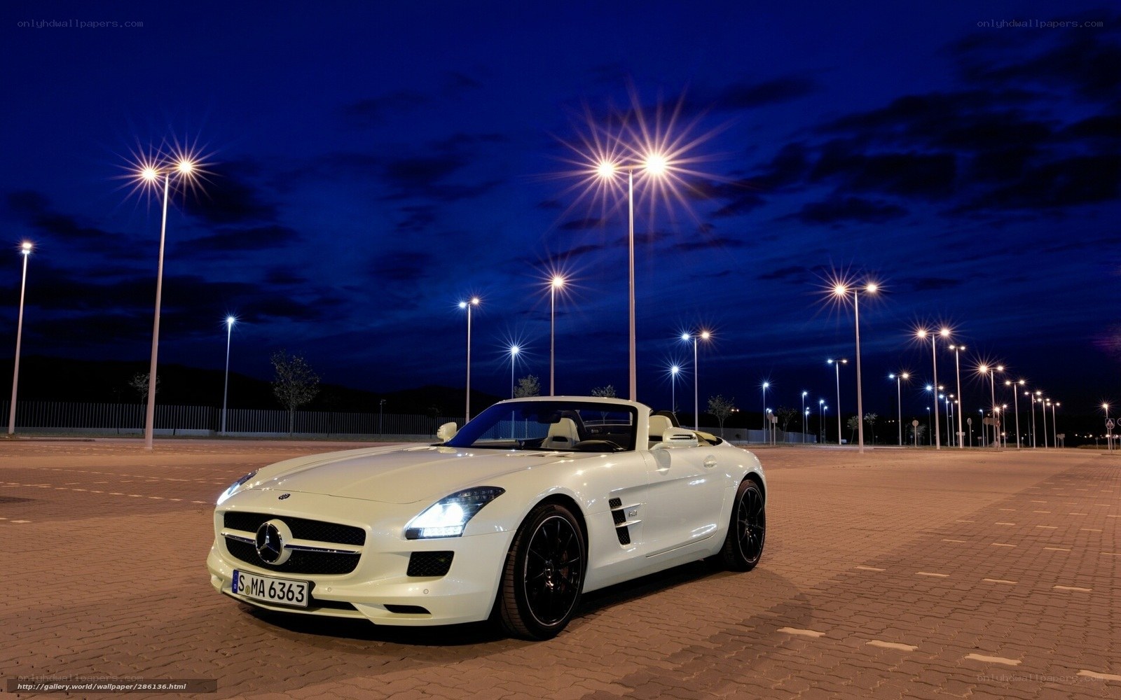 White Mercedes-Benz SLS AMG at night