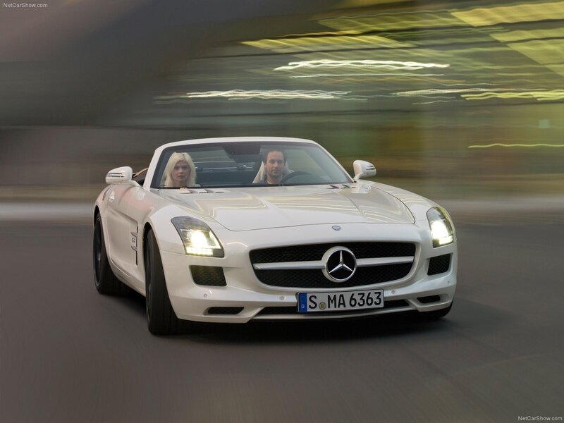 White Mercedes-Benz SLS AMG driving