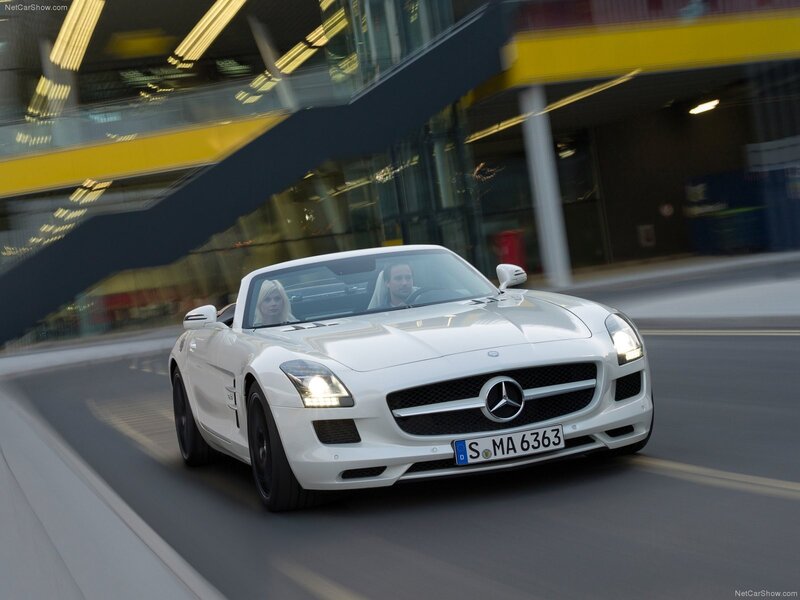 White Mercedes-Benz SLS AMG driving
