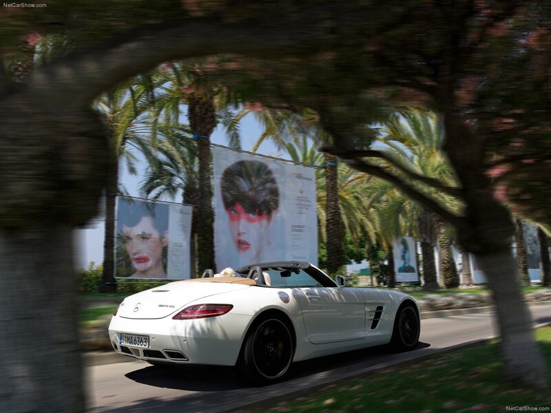 White Mercedes-Benz SLS AMG driving