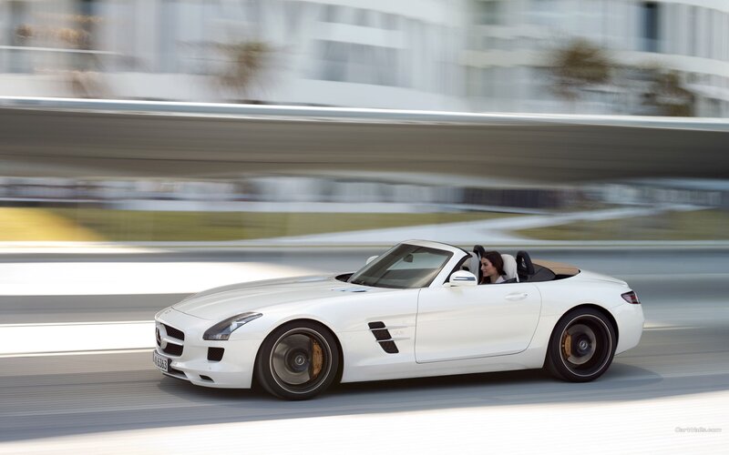 White Mercedes-Benz SLS AMG driving