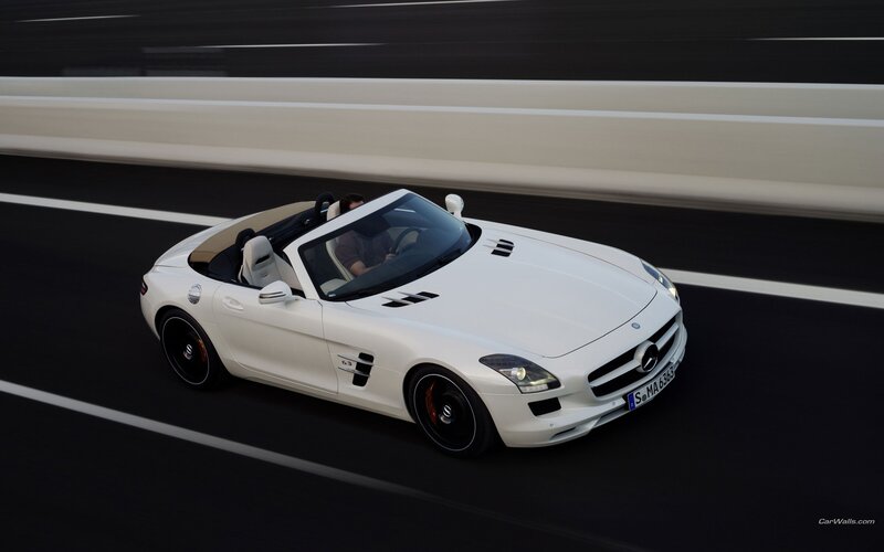 White Mercedes-Benz SLS AMG driving