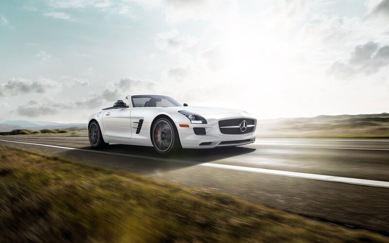 White Mercedes-Benz SLS AMG driving