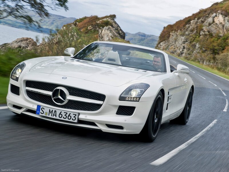 White Mercedes-Benz SLS AMG driving