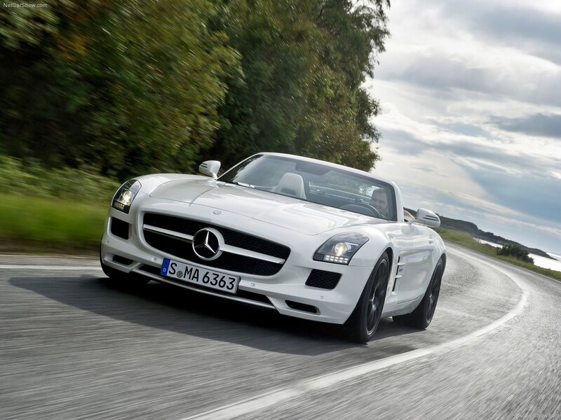 White Mercedes-Benz SLS AMG driving