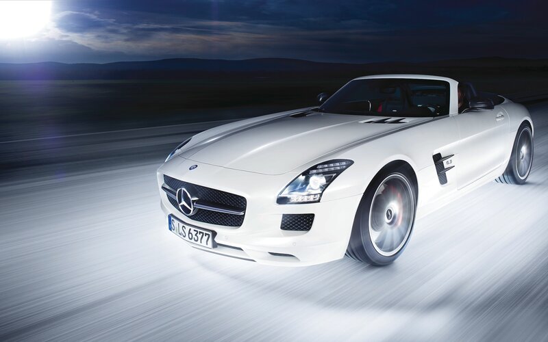 White Mercedes-Benz SLS AMG in motion