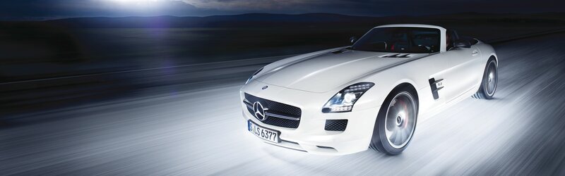 White Mercedes-Benz SLS AMG in motion