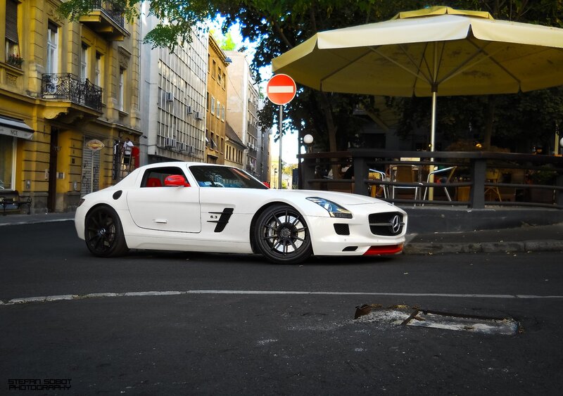 White Mercedes-Benz SLS AMG on city street