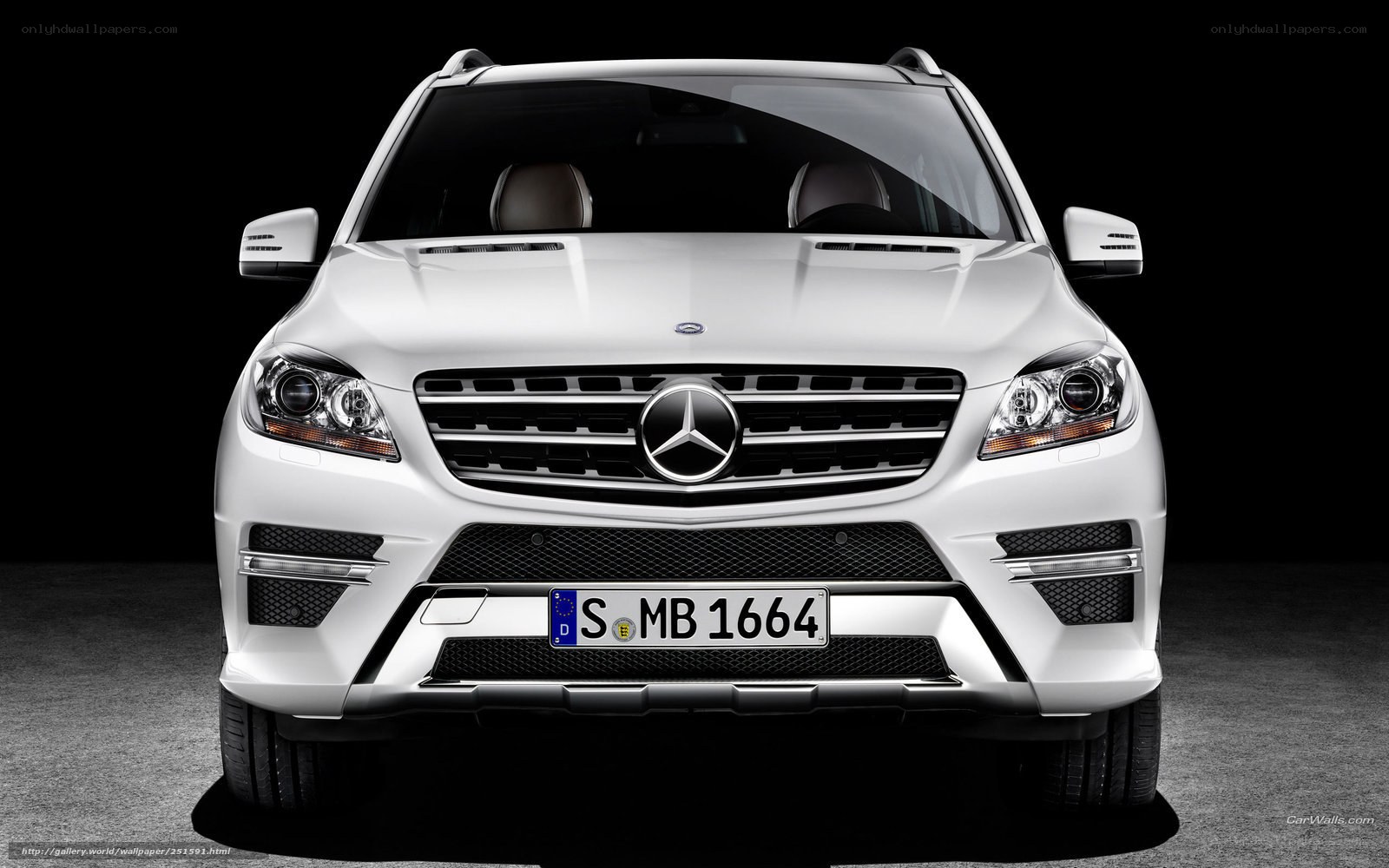 white mercedes-benz suv front view