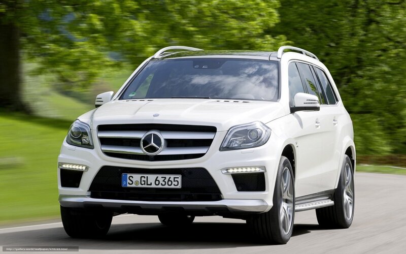White Mercedes-Benz SUV in motion