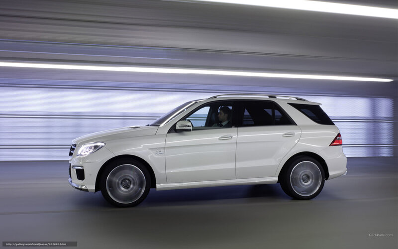 white mercedes-benz suv in motion