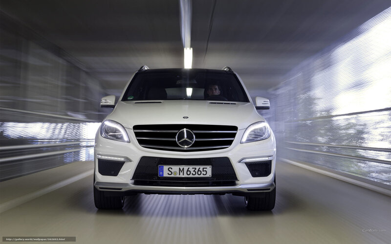 White Mercedes-Benz SUV in tunnel