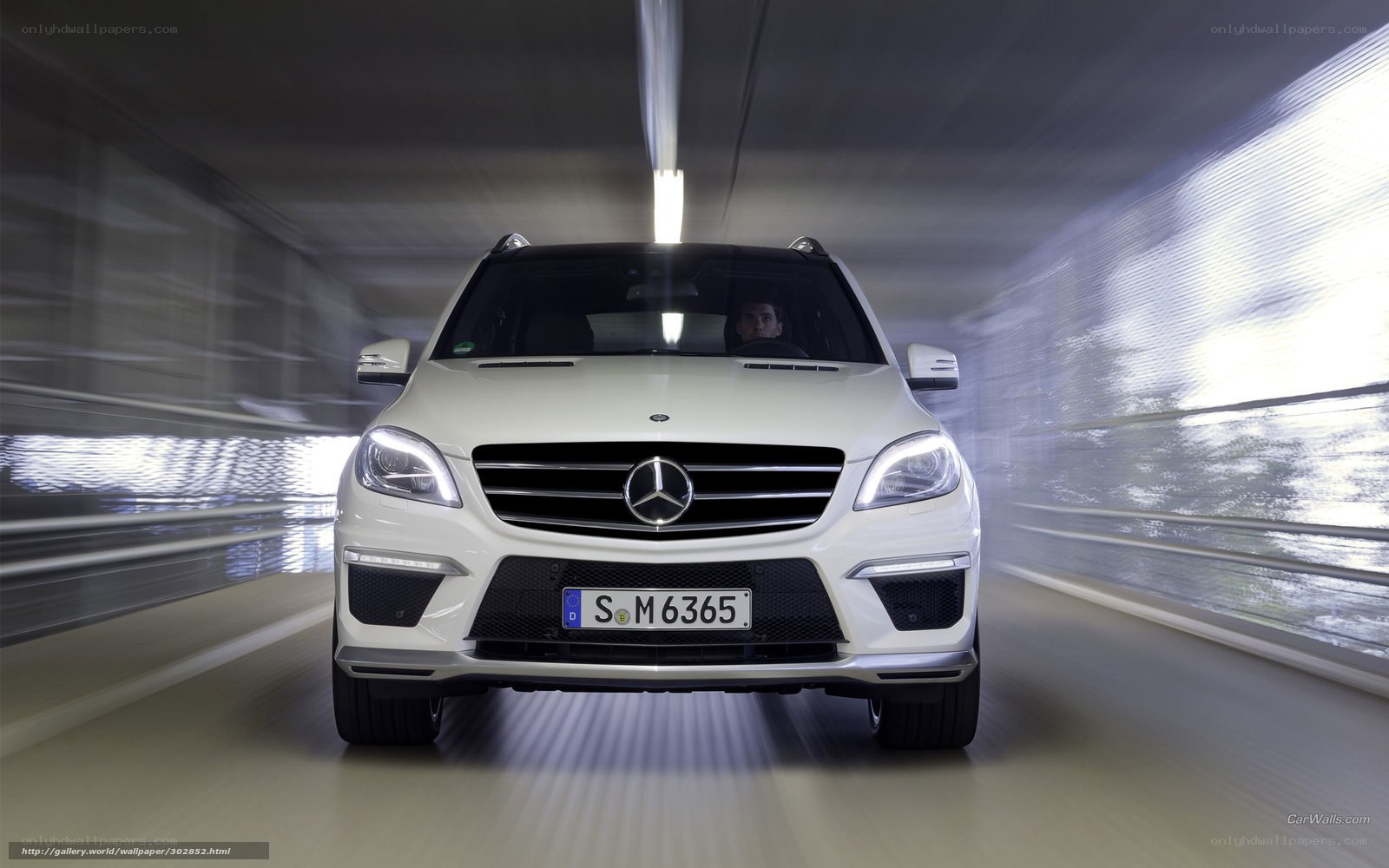 White Mercedes-Benz SUV in tunnel