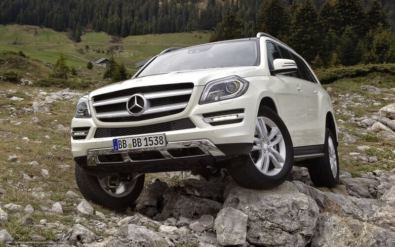 White Mercedes-Benz SUV on rocky terrain