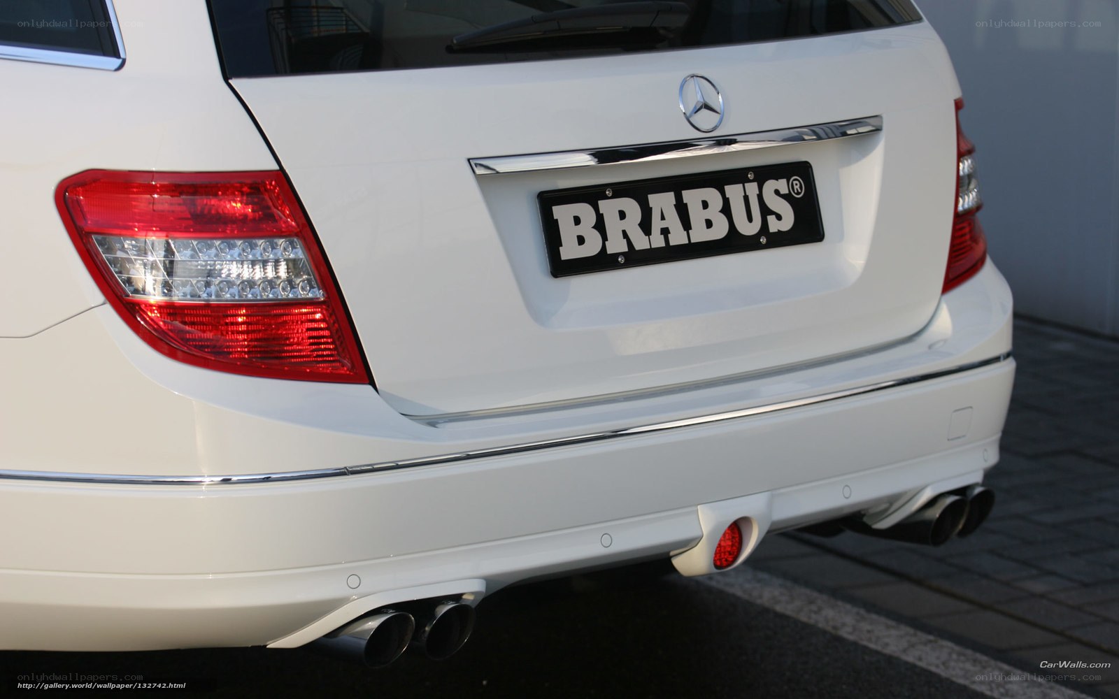 white mercedes-benz with brabus badge