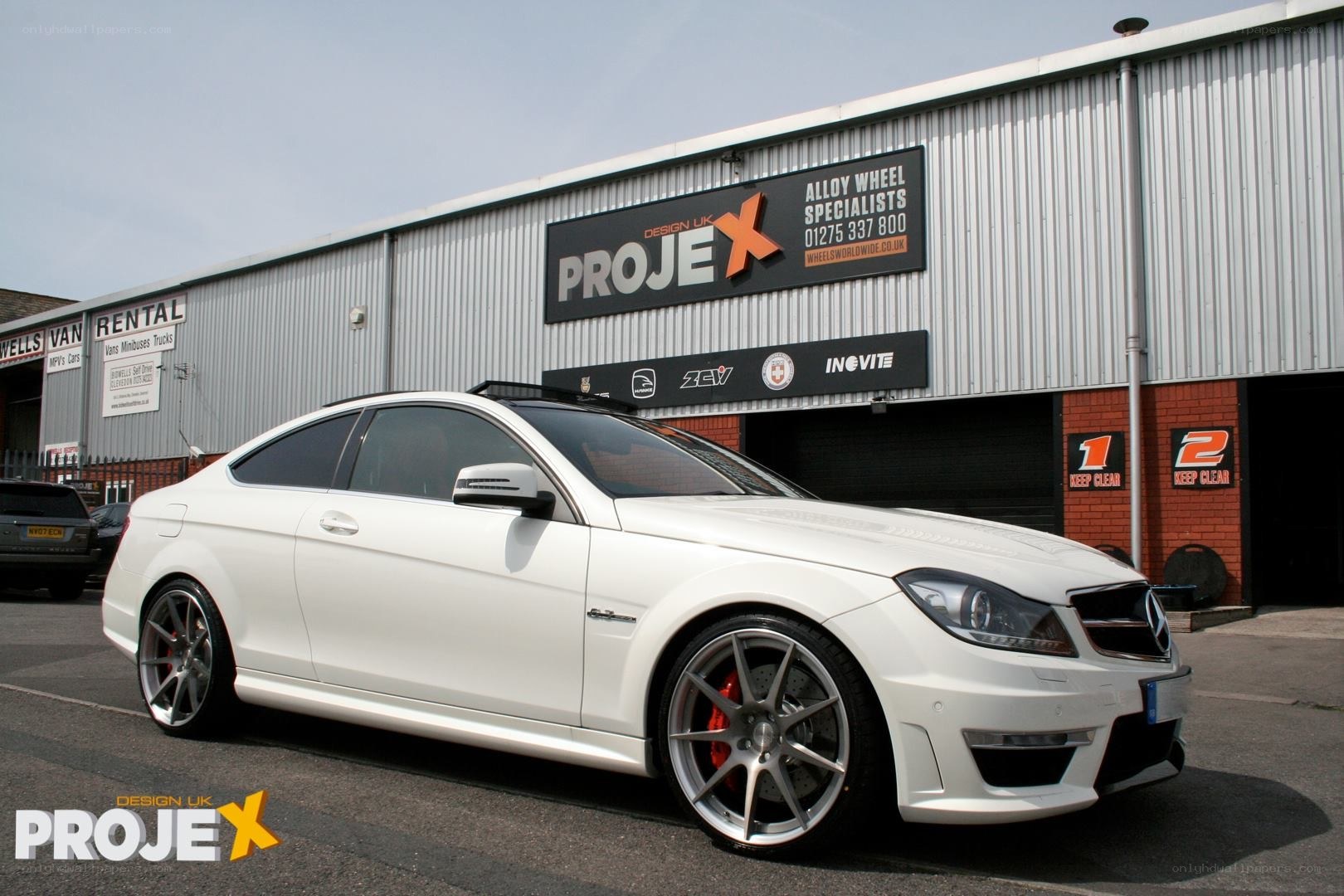 white mercedes c63 amg