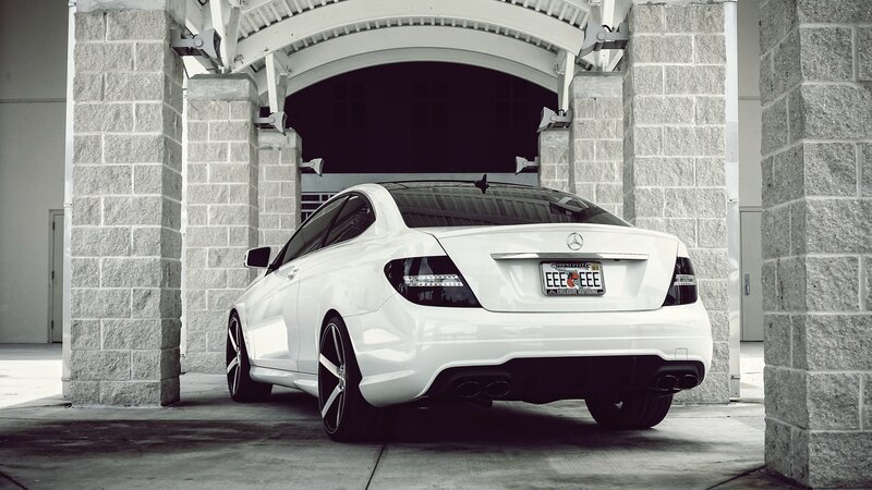 white mercedes c63 coupe