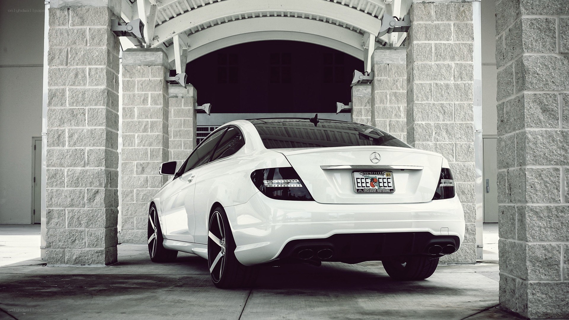 white mercedes c63 coupe