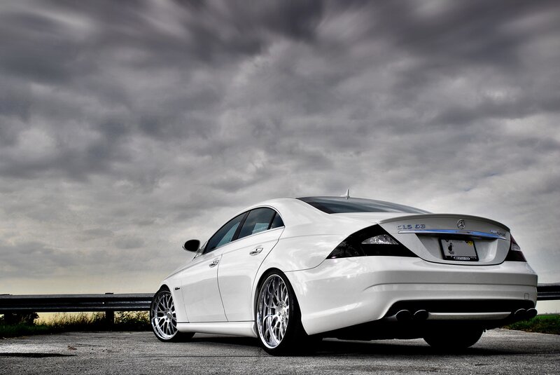 white mercedes cls parked on road