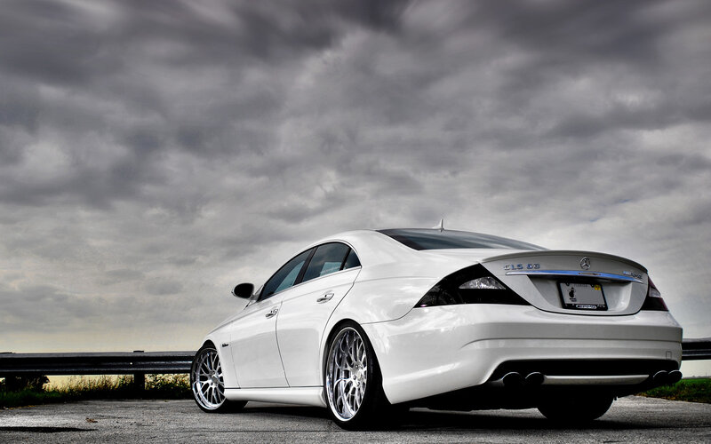 white mercedes cls55 on cloudy day