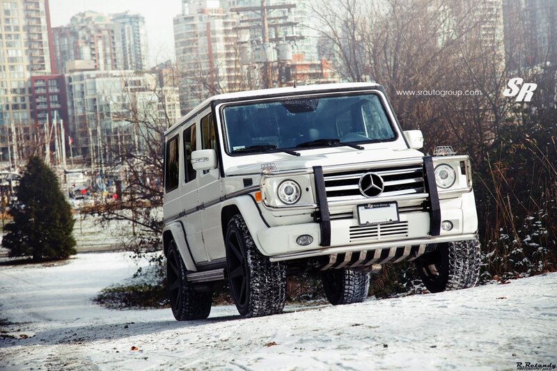 White Mercedes G-Wagon in snow
