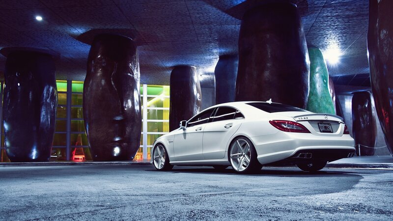 white mercedes in modern art gallery