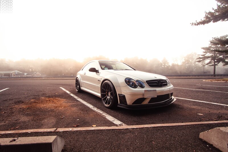 white mercedes in parking lot